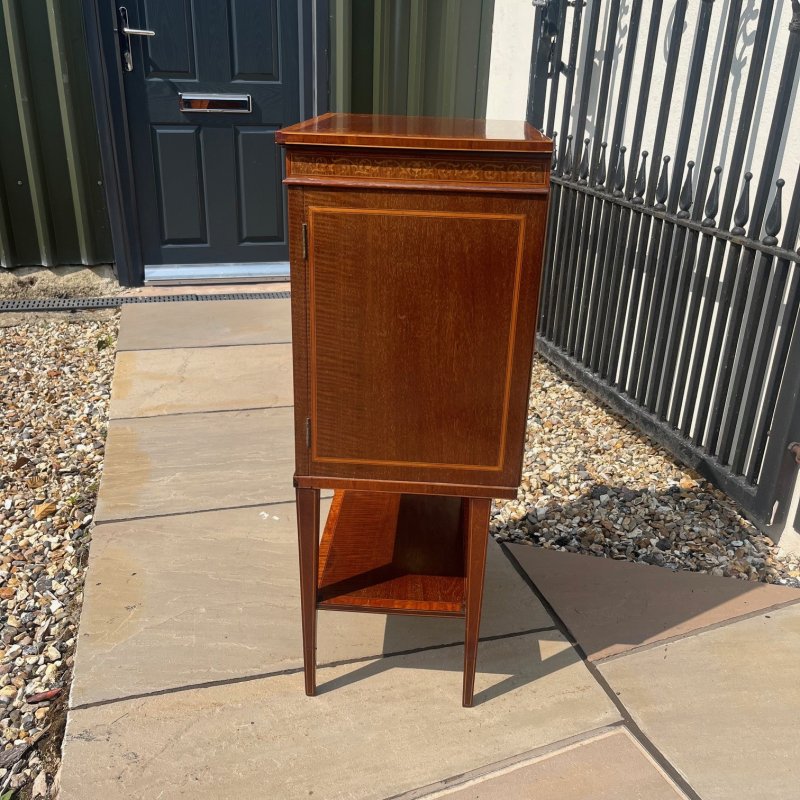 A Fine Quality Edwards and Roberts Of London marquetry inlaid music cabinet
